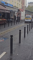Wet day street scene captured in Aubervilliers, France