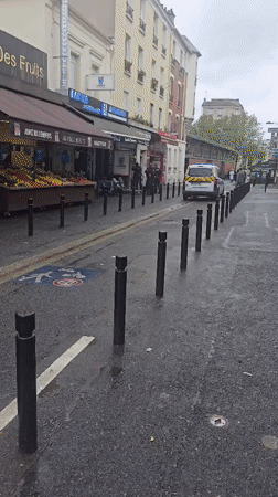 Wet day street scene captured in Aubervilliers, France