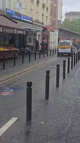 Wet day street scene captured in Aubervilliers, France
