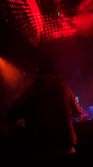 DJ performs at red-lit Moscow nightclub Wednesday evening