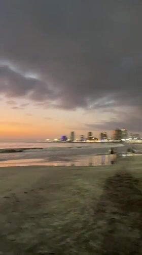 Sunset filmed along Iquique beach coastline in Chile
