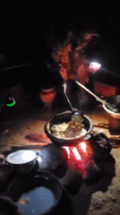 Man cooks over open fire in Winters, Texas
