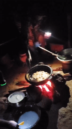 Man cooks over open fire in Winters, Texas