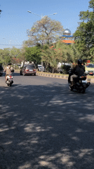 Morning traffic flows through a busy East Java corridor