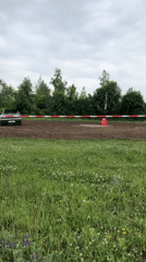 Outdoor car event features racing and social gathering