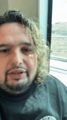 Bearded man in black turtleneck filmed on Jerusalem transit