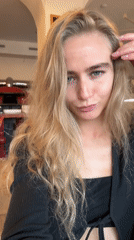 Woman documents rainy morning cafe visit with selfies and food