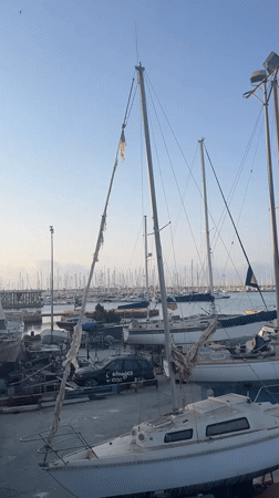Torrevieja boatyard: hauled-out vessels and storm-damaged rigging