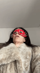 Morning indoor scenes captured in Konz: masked woman, sleeping cat