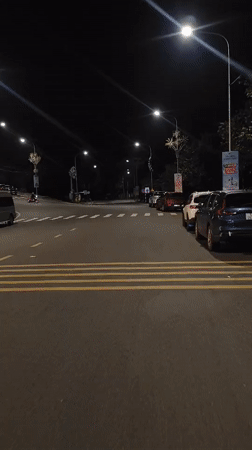 Nighttime streets and neon signs in Da Lat, Vietnam