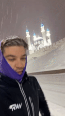 Man records video at snowy Kazan Kremlin mosque