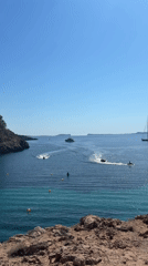 Sun-soaked afternoon along Sant Antoni's rocky Ibizan coastline