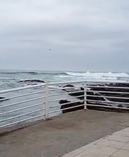Rough seas, overcast skies documented along Iquique coastline