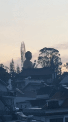 Evening scenes captured in Đà Lạt: Buddha statue, arranged items