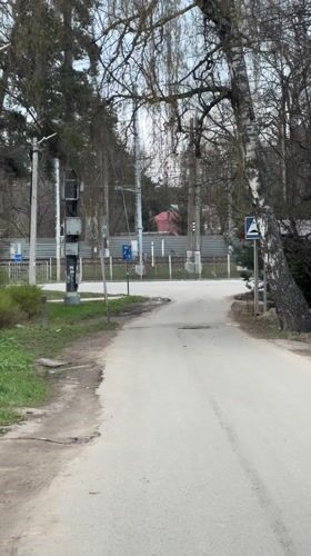 Train observed passing through wooded area near Tomilino, Russia