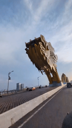 Close-up footage captured of Dragon Bridge's golden head in Da Nang