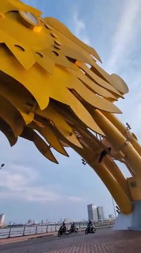 Close-up footage captured of Dragon Bridge's golden head in Da Nang