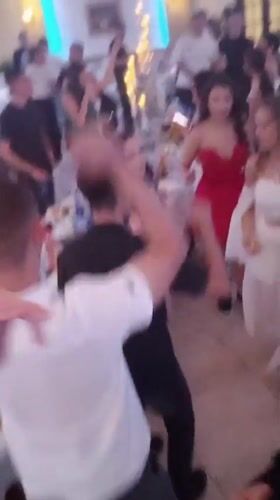 Young adults dance at celebration in Parvomai, Bulgaria
