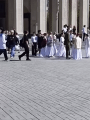 Students rehearse in formal attire at Novosibirsk plaza