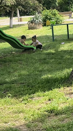 Children play on slide at Lozarevo playground