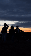 Young women enjoy sunset gathering in Фоки, Russia