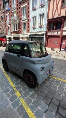 Street scenes and landmarks in central Rouen, July morning