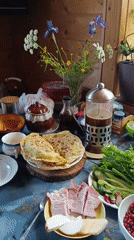 Elderly man enjoys breakfast spread in Верея, Russia home