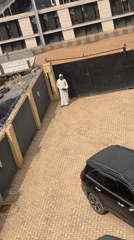 Construction activity and daily life documented across Abuja neighborhoods