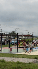Morning community life bustles in overcast Davao City