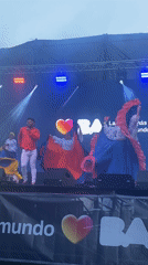 Folk performers in traditional costumes gather at Buenos Aires plaza