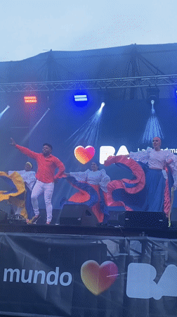 Folk performers in traditional costumes gather at Buenos Aires plaza