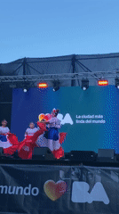 Three women perform synchronized dance in Buenos Aires
