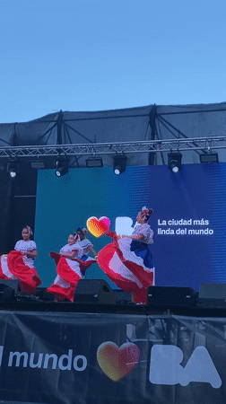 Three women perform synchronized dance in Buenos Aires