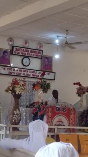 Religious ceremony unfolds in a decorated Lagos hall