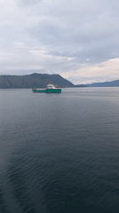 Ferry crossing Lake Toba on an overcast morning