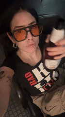 Person drinks beer, watches music videos with dogs in Buenos Aires
