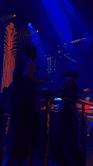 Performers dance on nightclub platform in Sofia