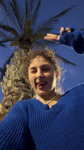 Evening selfies and moonlit palm trees in Kiryat Bialik