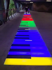 Illuminated piano walkway attracts pedestrians in Yuzhong District