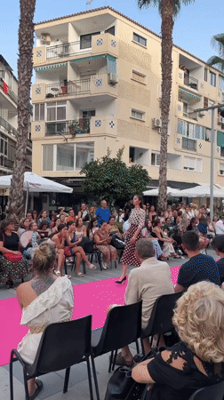 Street fashion show on a pink runway in Torremolinos