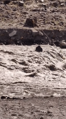 Turbulent river and mountain scenery at Sissu, Himachal Pradesh