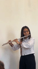Kids' music recital with flutes, piano, violin, and vocals