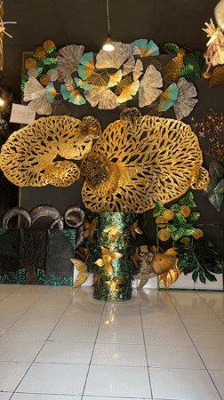 Art gallery interior documented in Tegallalang, Indonesia features metalwork, carvings