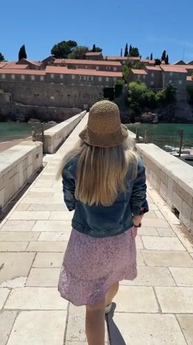 Tourist photoshoot captured at iconic Sveti Stefan, Montenegro
