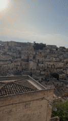 Matera's ancient cave city carved into golden stone hillsides