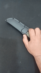 Knife removed from sheath in Yeghegnadzor, Armenia