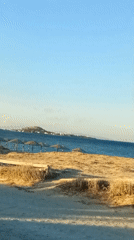Sunrise to mid-morning along a tropical coastal resort and marina