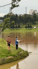 Young anglers fish muddy waters in Da Lat