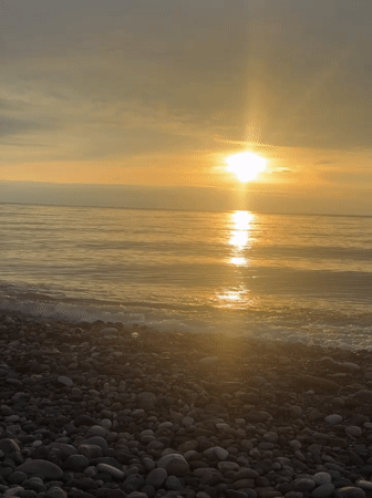 Sunset observed over water in Batumi, Georgia