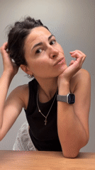 Woman documents casual evening gaming session in Budva apartment